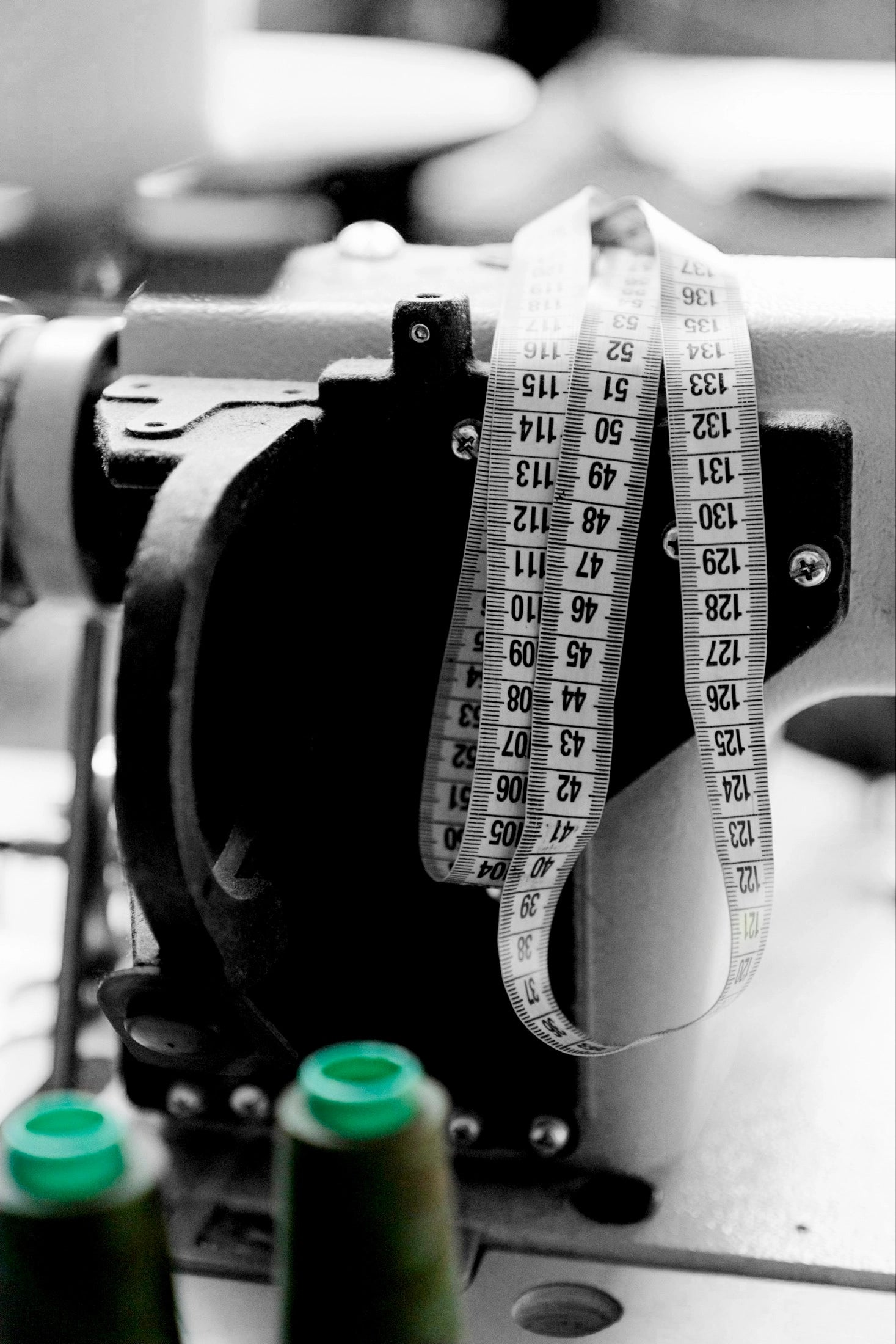 MMS fashion agency performing precision quality assurance checks on textile machinery.