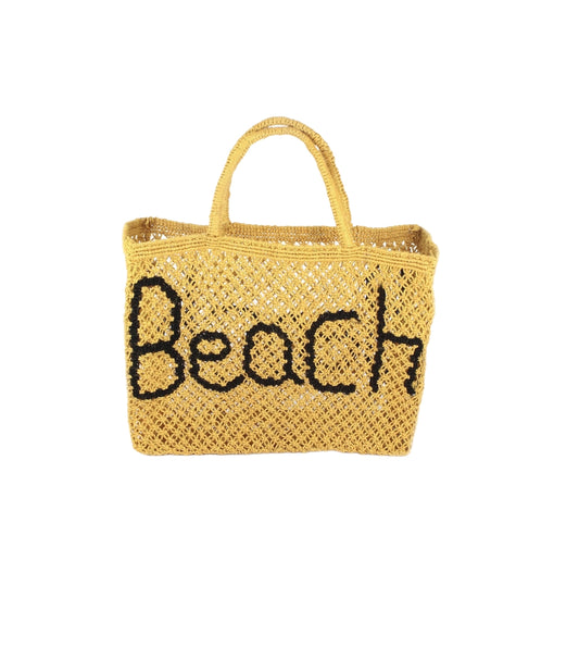 Custom oversized jute beach bag sample with soft cotton rope handles and internal waterproof lining by Middleman Sourcing.