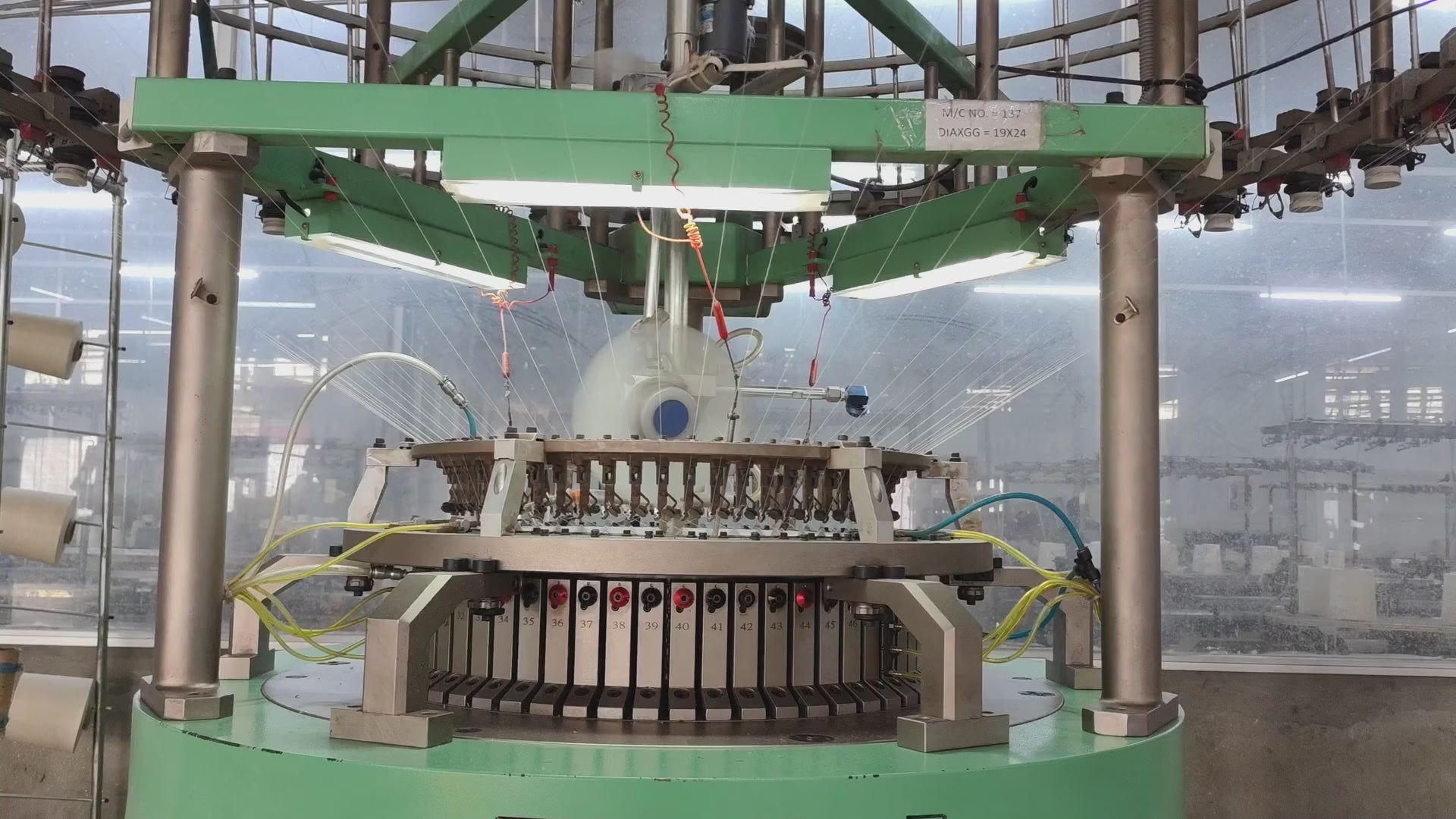 Load video: High-speed knitting machine producing sustainable raw materials. 