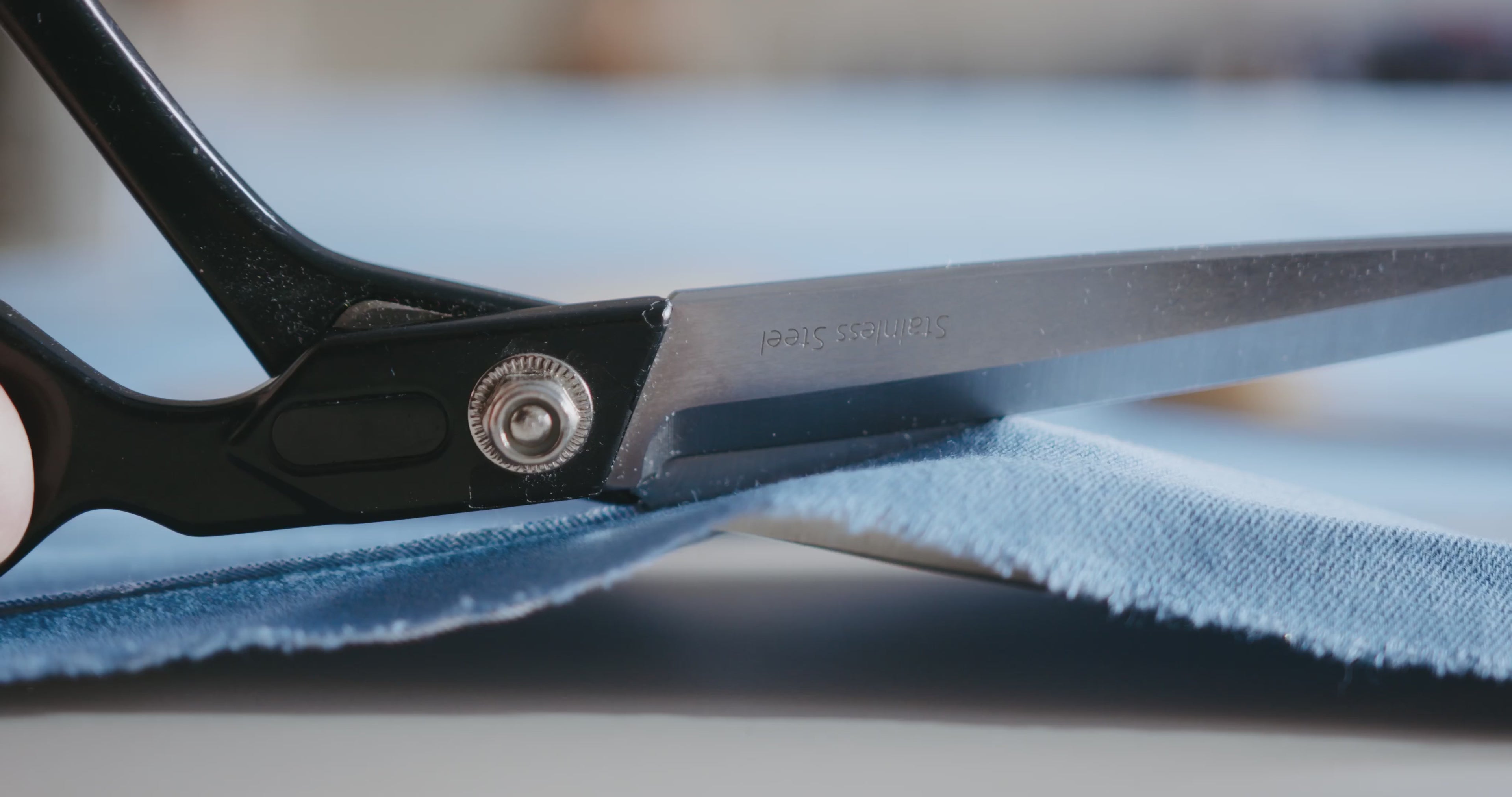 Load video: MMS fashion agency production process video showing factory oversight and garment manufacturing steps.